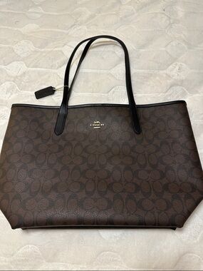 Coach Brown Signature Canvas Tote with Black Leather Straps